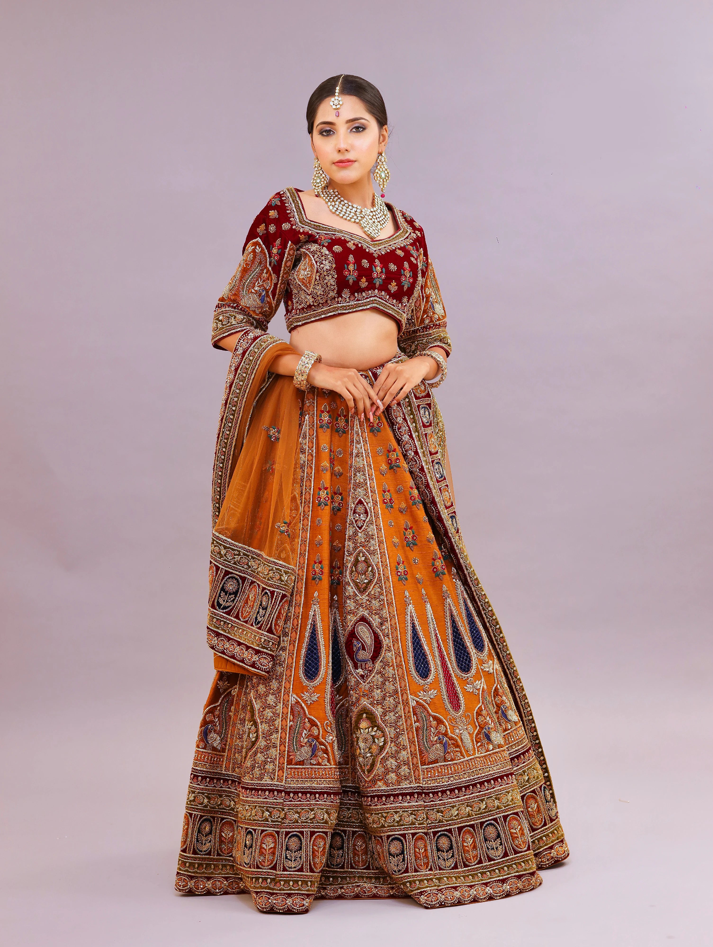 THE COPPER ORGANZA RECEPTION LEHENGA BY TANU KHERA DESIGNS main image 0