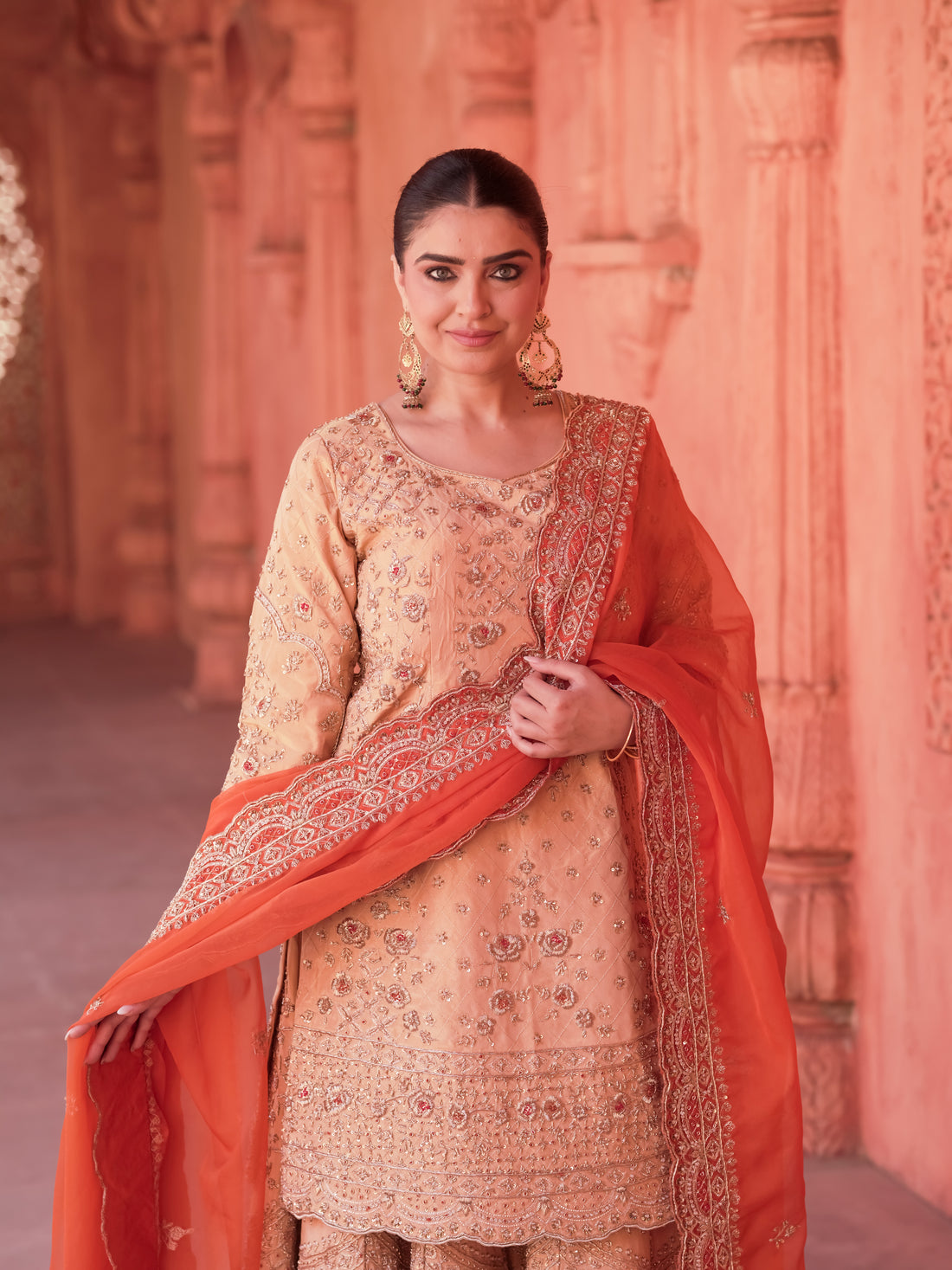 Kesari Gul peach gold sharara set with coral red dupatta