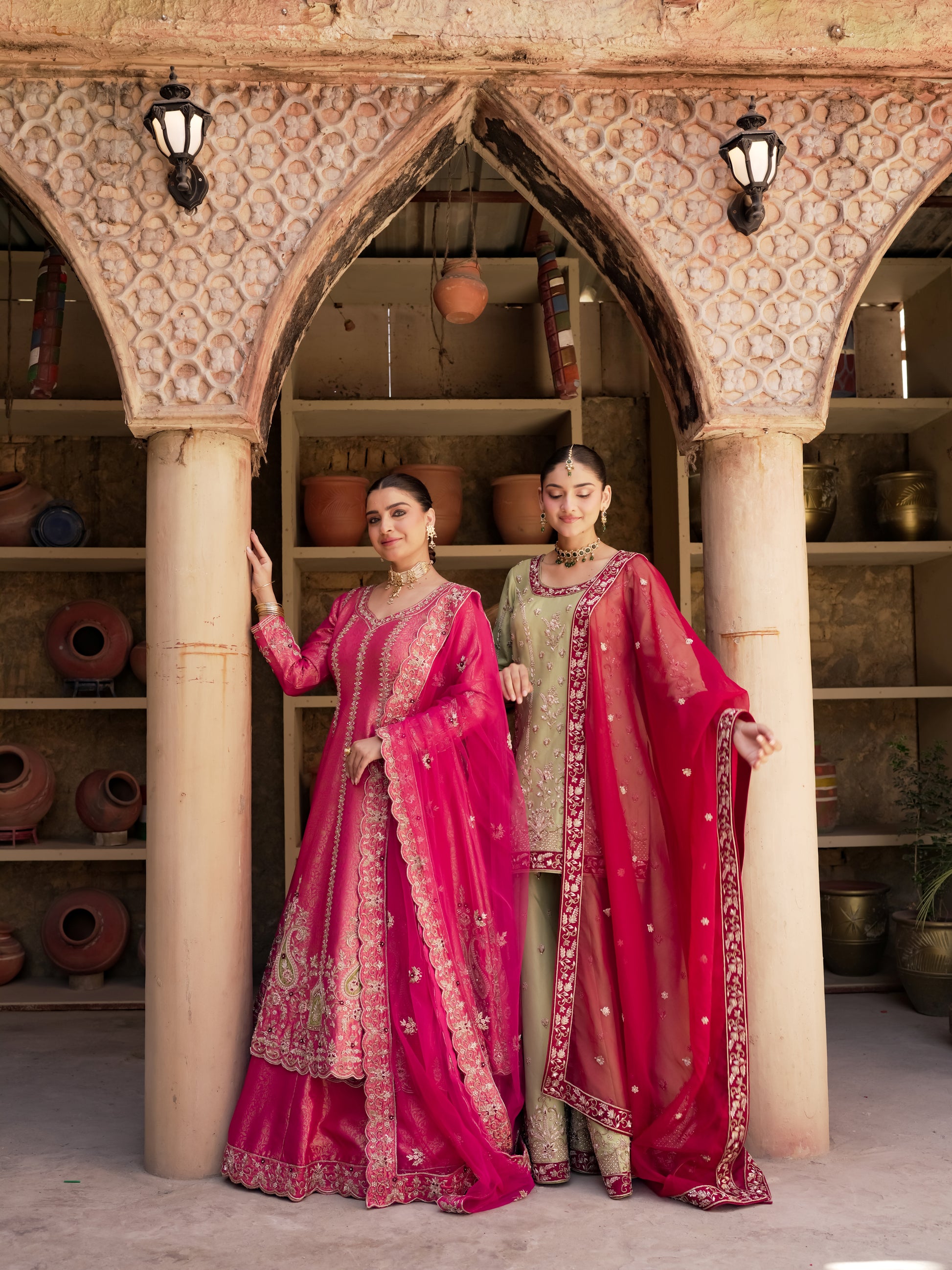 Pink Anarkali lehenga with paisley medallions and scalloped borders