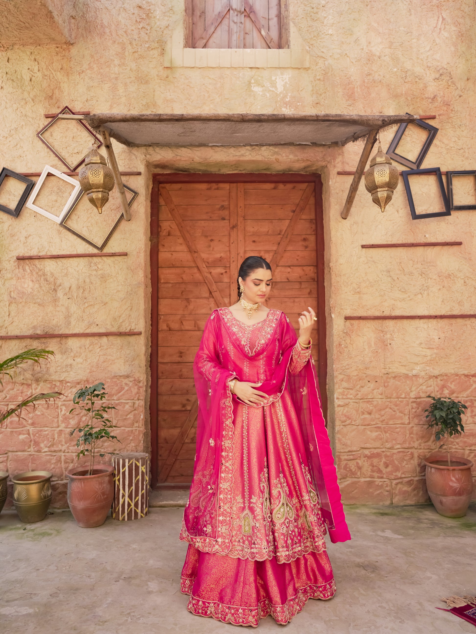 Fuchsia pink festive Anarkali lehenga with gold zari embroidery