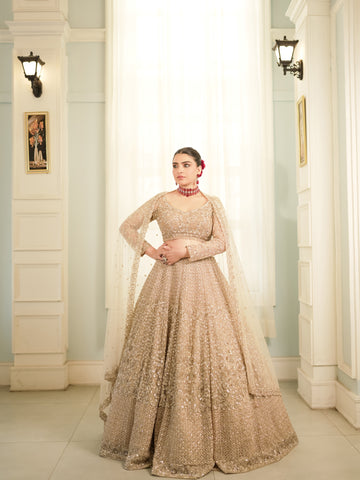 Sunehri Jaal champagne gold reception lehenga with cape-style dupatta