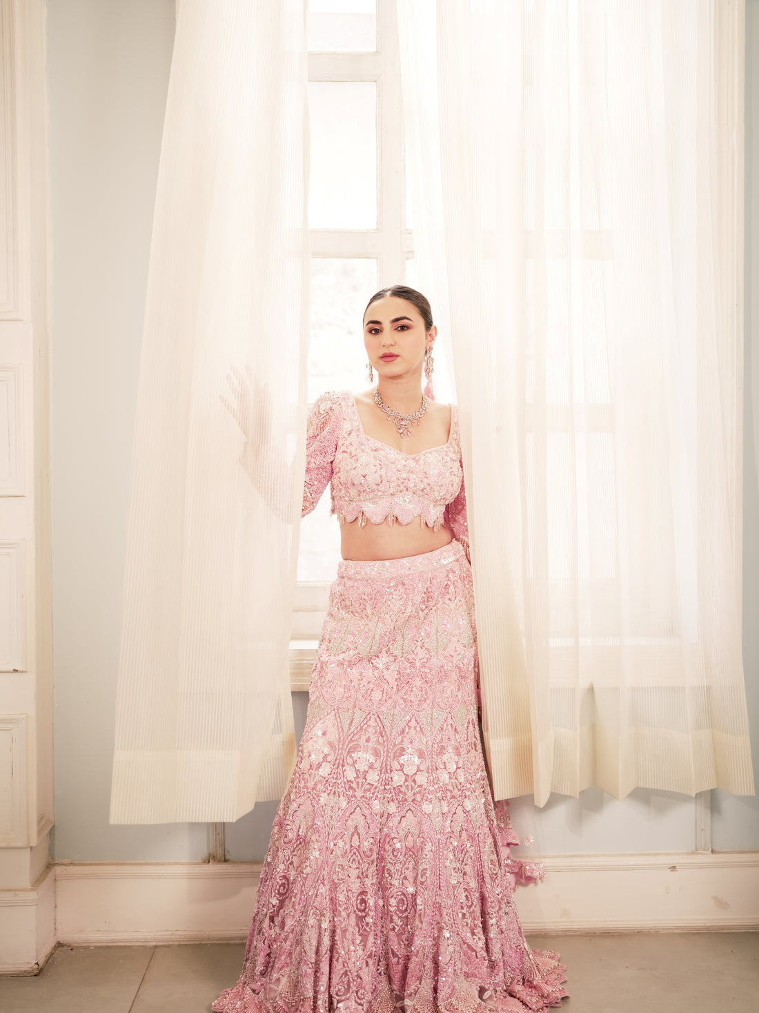 Gulabi blush pink fishtail reception lehenga with sheer dupatta