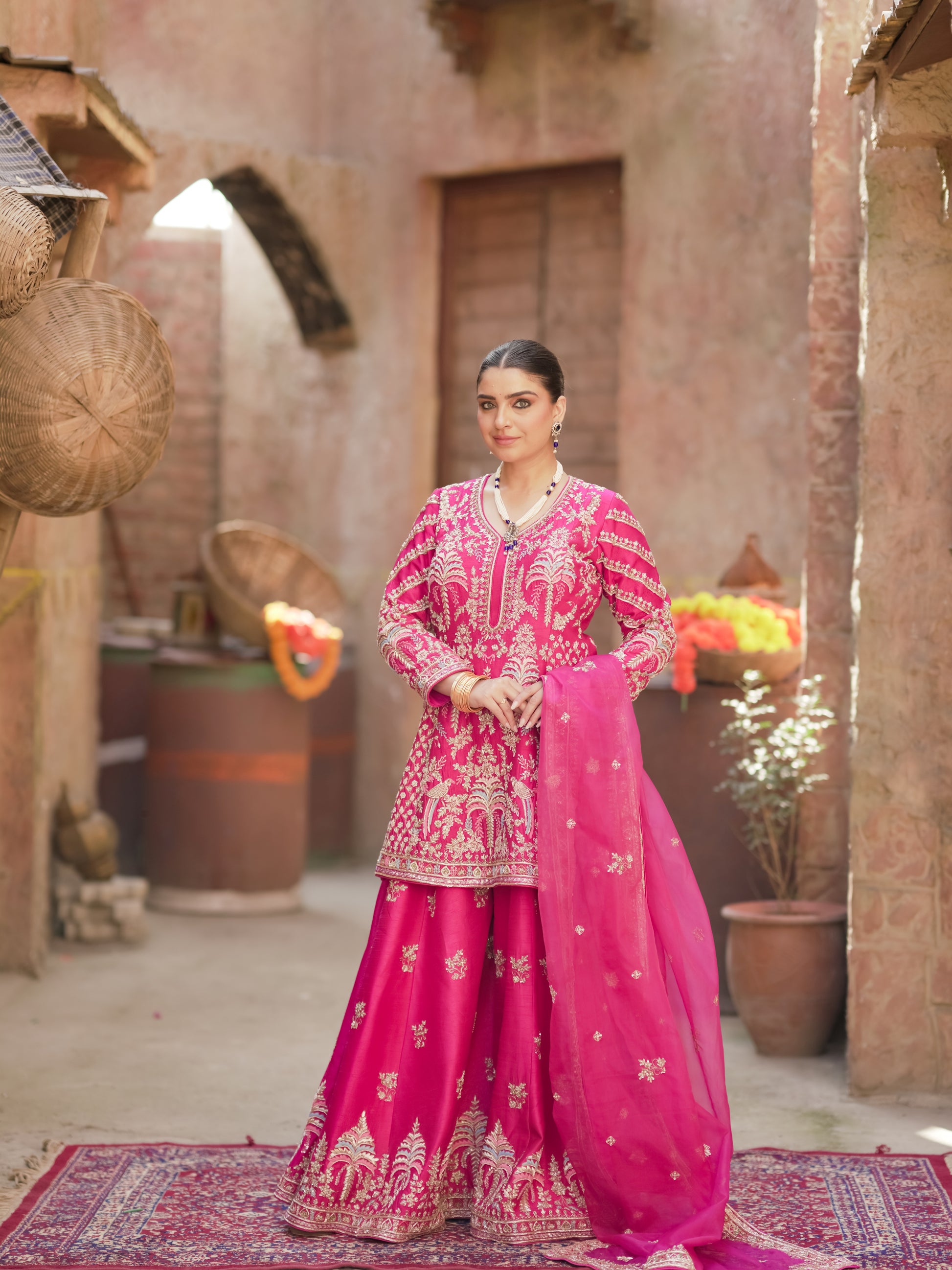 Rani Morbagh vibrant rani pink kurta lehenga set with bordered dupatta