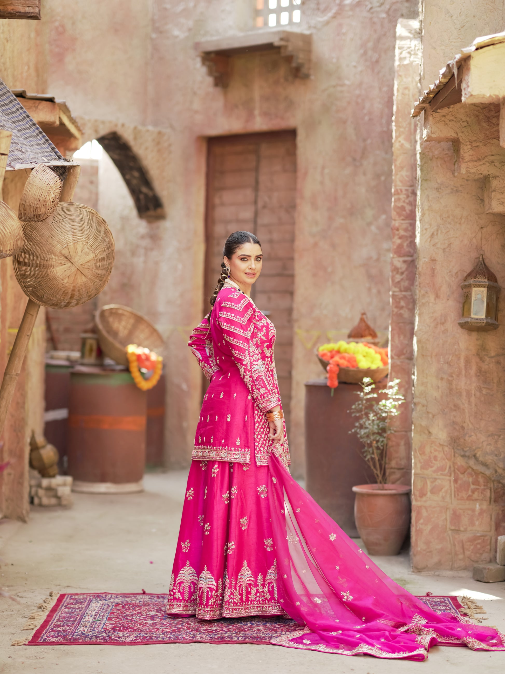 Rani pink festive kurta lehenga with antique gold zari and resham 
