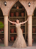 Gold evening gown with cut-out waist fine straps and crystal embroidery