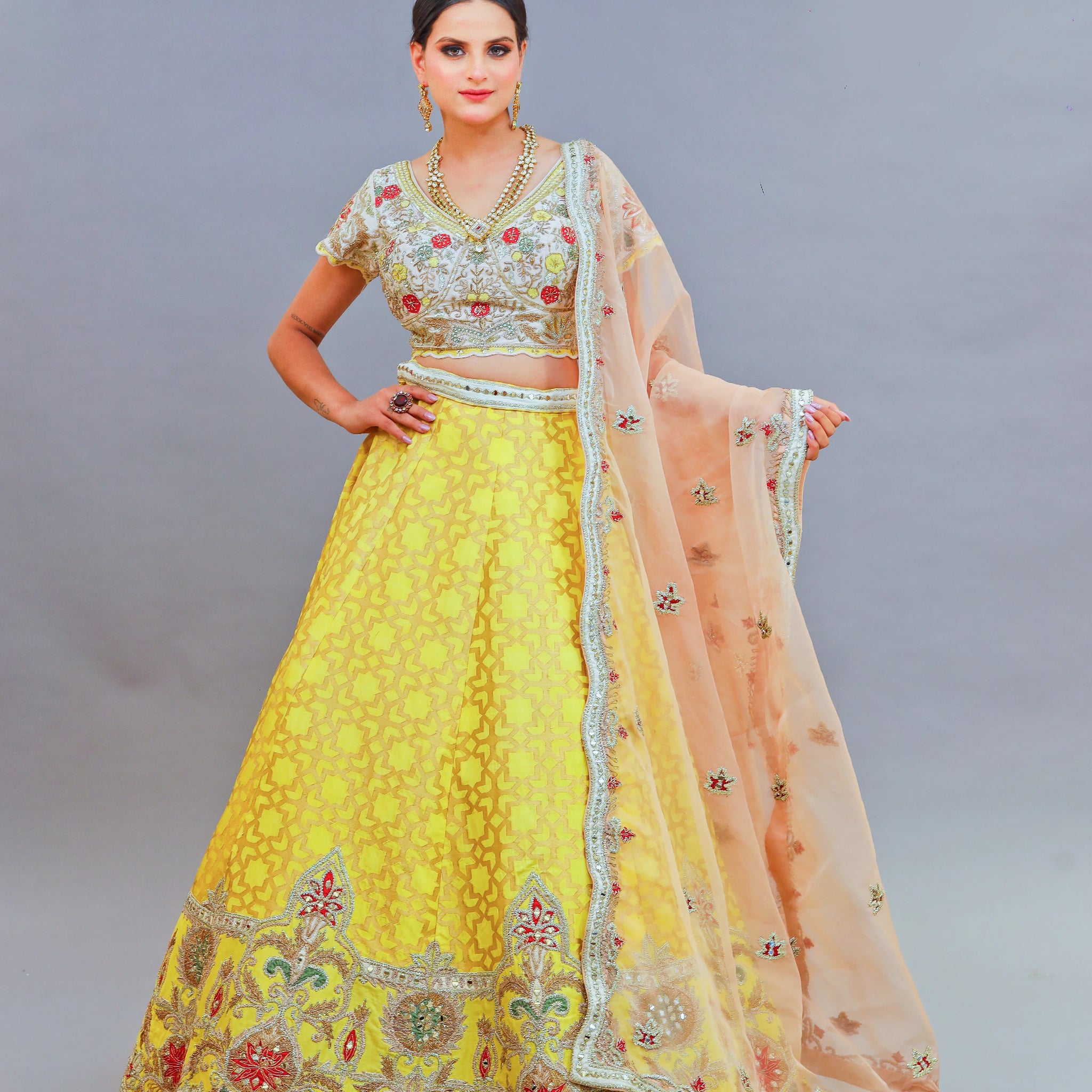 Yellow Brocade Nakshi Work Lehenga with Floral Motifs