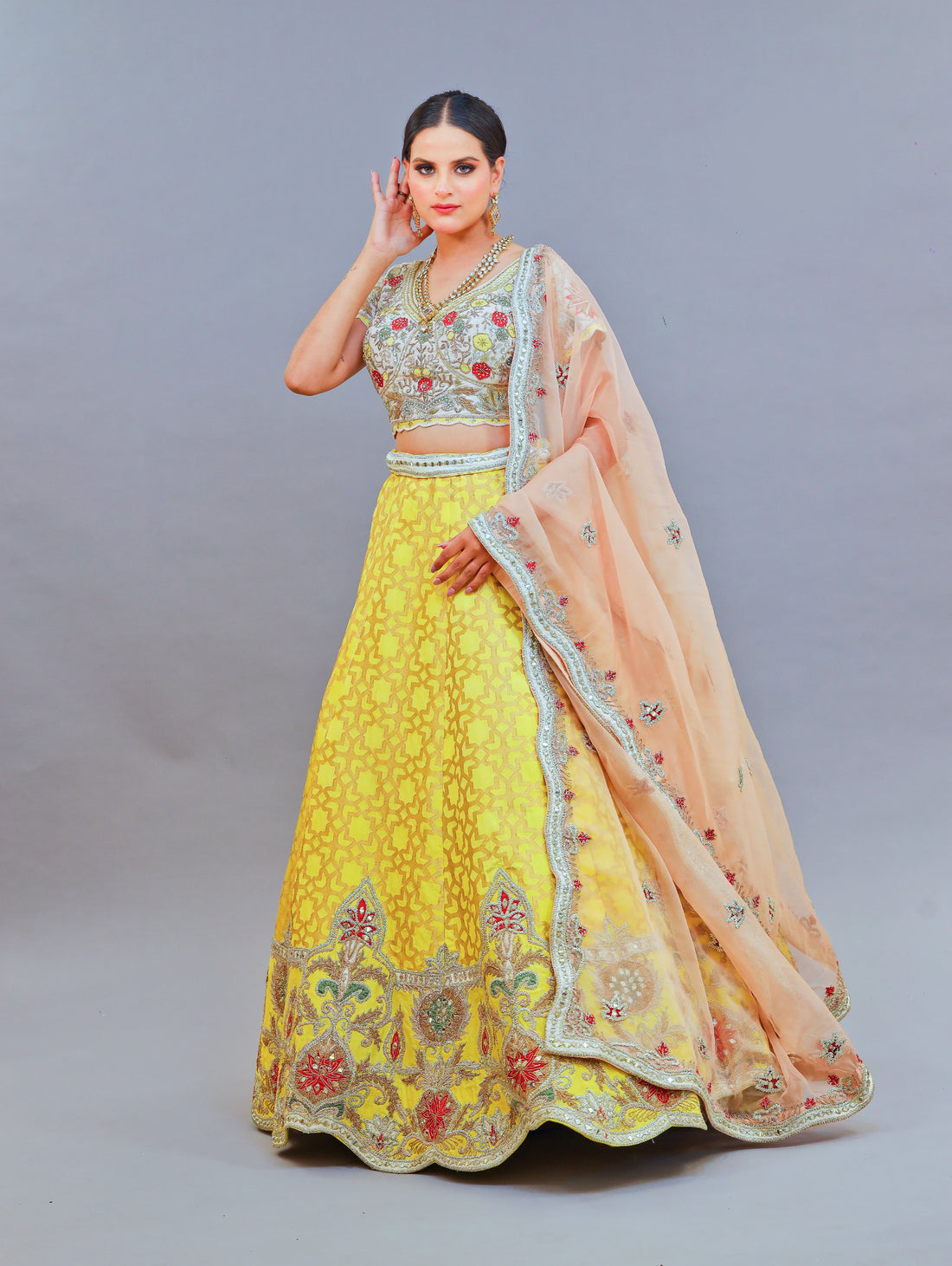 Yellow Brocade Nakshi Work Lehenga with Floral Motifs