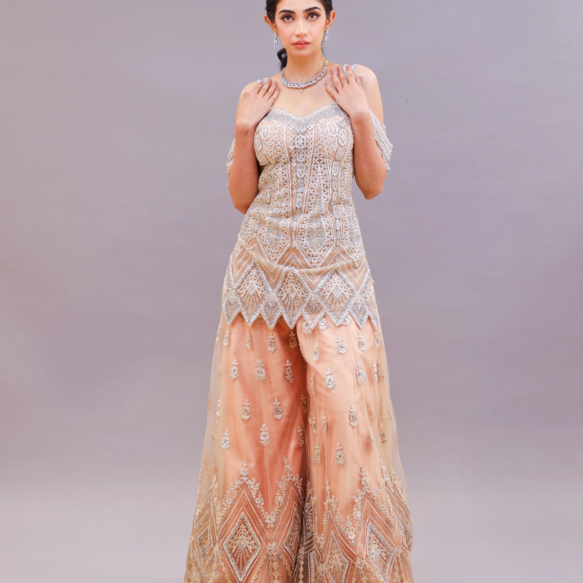 Chic Peach Sharara Set with Cut Dana and Sequins Work