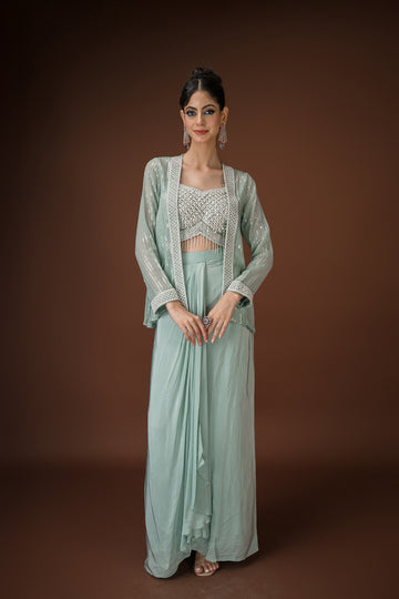 C-green Crepe palazzo Paired with a coordinated sheer jacket