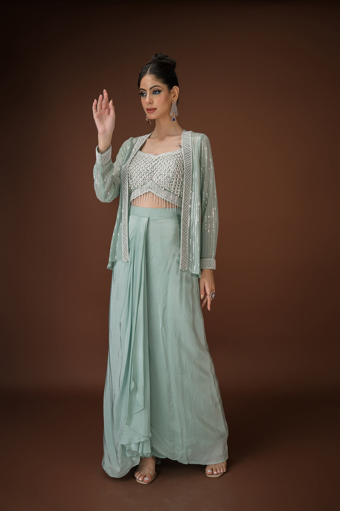 C-green Crepe palazzo Paired with a coordinated sheer jacket