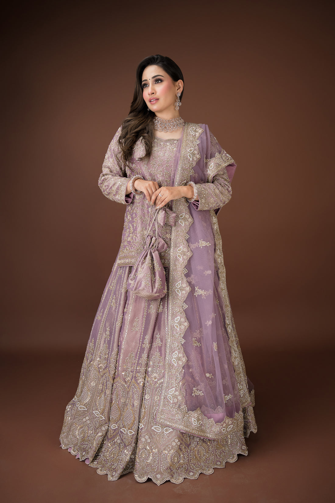 Mauve lehenga with high-neck kurti-style blouse and paired with full sleeves