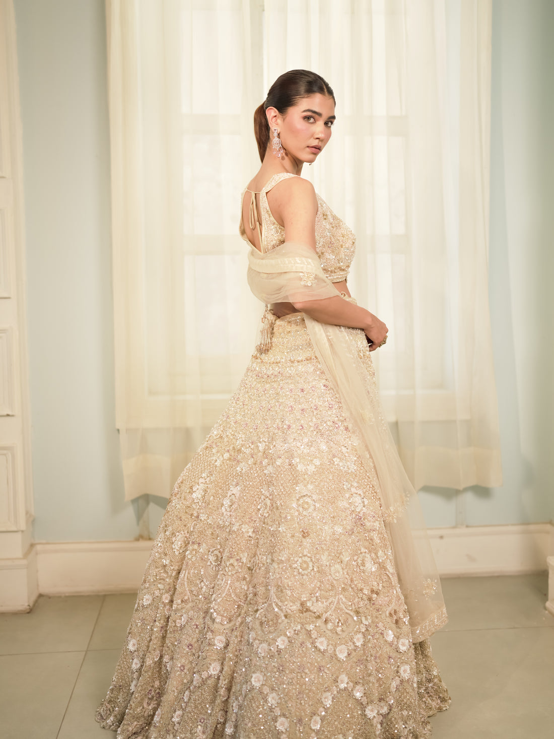 Noor Gul pearl ivory reception lehenga with champagne blush detailing