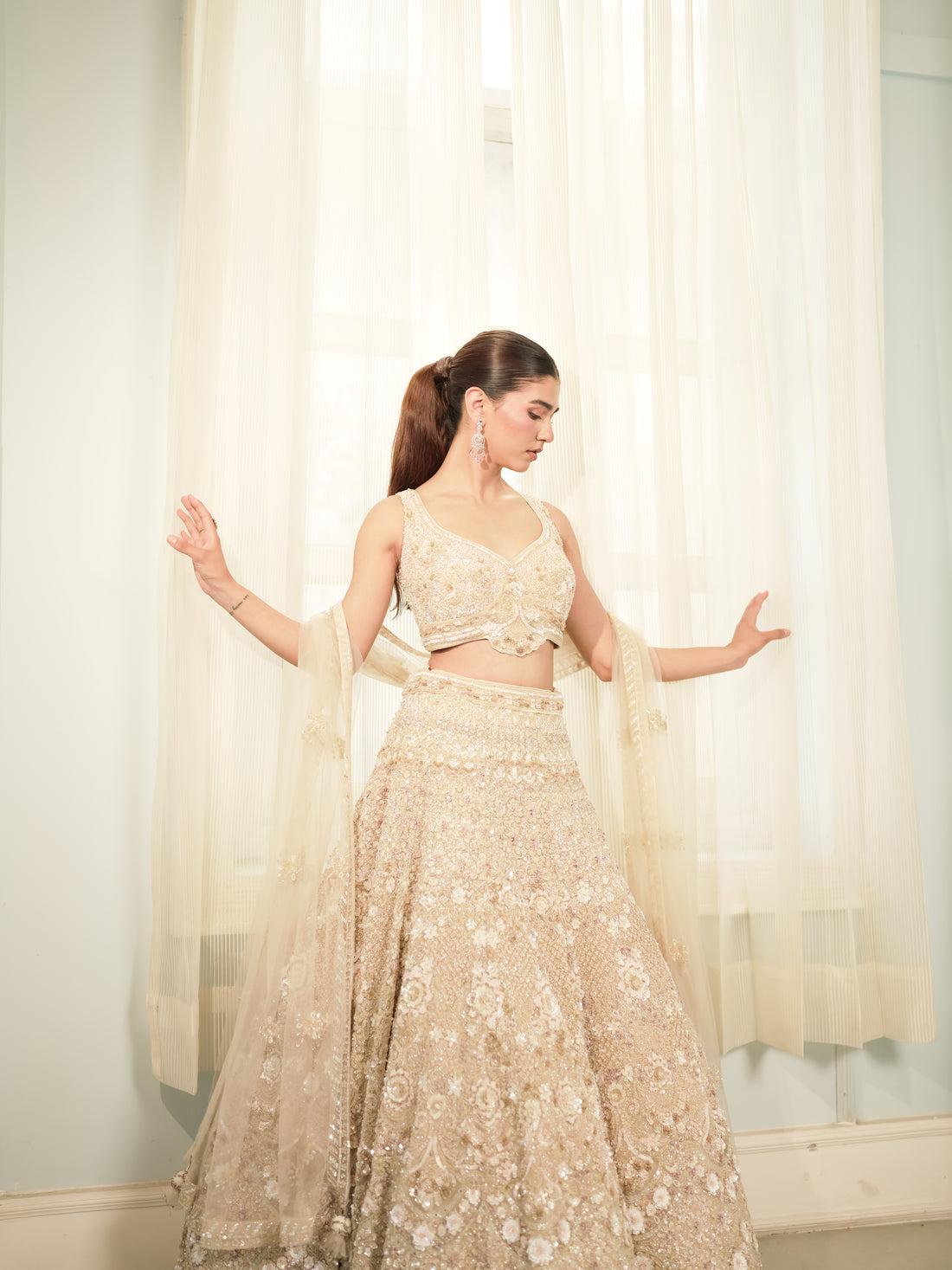 Noor Gul pearl ivory reception lehenga with champagne blush detailing